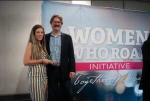 Two people at Women Who Roar event